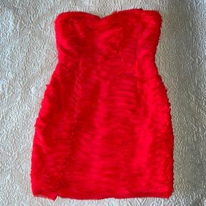 Gorgeous never-worn little red mini-dress! Zips in back- hugs curves.